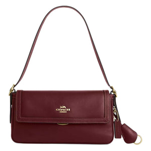 COACH Etta 25 حقيبة مارون متوسطة تجمع بين الفخامة والعملية.