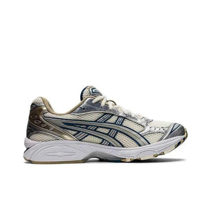 Asics Gel Kayano 14 حذاء ذهبي فضي.