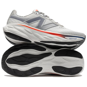 Light grey New Balance running shoe stacked on top of a second shoe, displaying both the side profile design and the black textured rubber outsole tread