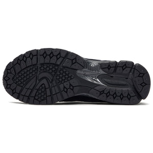 Bottom sole traction pattern of the New Balance 1906L Triple Black for reliable grip.