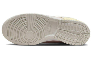 Inspect the durable outsole of Nike Shoes and حذاء نايك الأصلي الذي يضمن راحة شوز نايك، مع ميزات حذاء نايكي دنك لو وردي وأصفر | Nike Dunk Low Disrupt 2 ومواصفات nike schuhe.