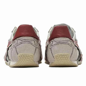 حذاء PandaPrank Onitsuka Tiger رياضي أبيض بتصميم عصري فريد.