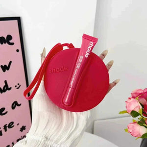 Rhode Beauty Peptide Lip Tint مع حقيبة سيليكون مطابقة اللون رود.