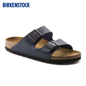 BIRKENSTOCK Arizona double-buckle slippers.
