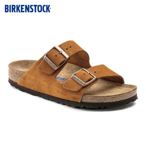 BIRKENSTOCK Arizona double-buckle slippers.