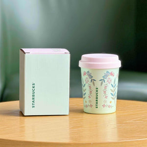Tumbler Starbucks بنقشة زهور الربيع ولون أخضر نعناعي.