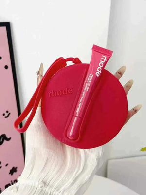 Rhode Beauty Peptide Lip Tint مع حقيبة سيليكون مطابقة اللون رود.
