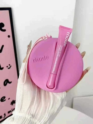 Rhode Beauty Peptide Lip Tint مع حقيبة سيليكون مطابقة اللون رود.