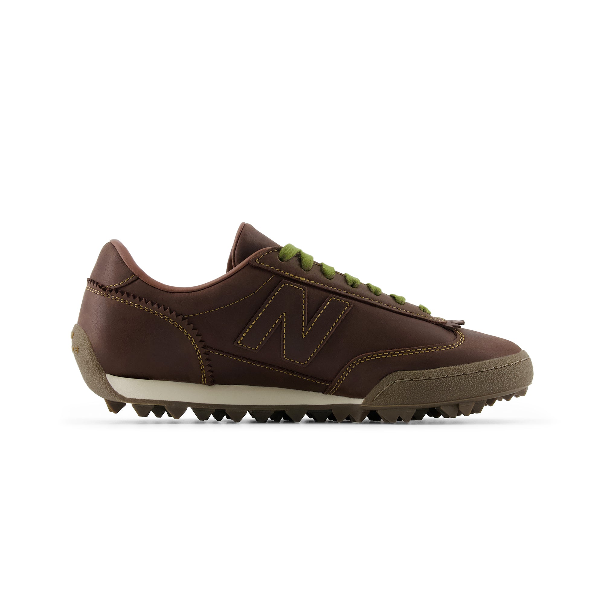Lateral side profile of Donald Glover x New Balance RC30 "Golden Hour" shoes, featuring a smooth dark brown leather upper with contrast olive yellow stitching, olive green laces, a matching brown leather N logo, off-white midsole, and a brown rippled studded rubber outsole.