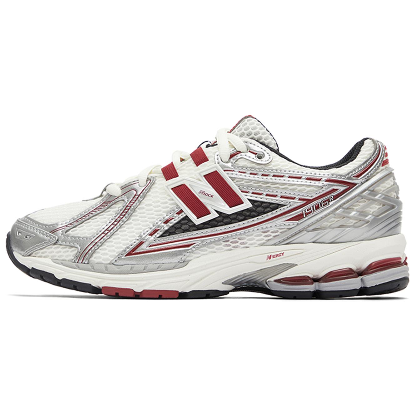 Lateral side profile of white, silver, and red New Balance shoes 1906R model, featuring a breathable white mesh base with metallic silver overlays, burgundy-red N-lock lace webbing, a silver TPU heel counter, and an off-white N-ergy cushioned sole with dark red heel pods.