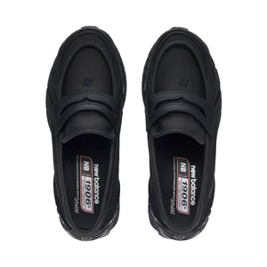 Top-down perspective of the New Balance 1906L Black Leather emphasizing the comfortable inner footbed and branding details.