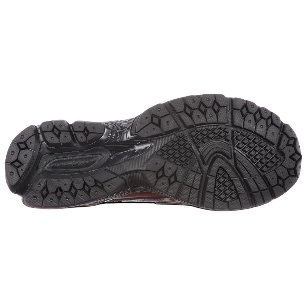 Bottom sole traction pattern of the New Balance 1906L Patent Burgundy for reliable grip.