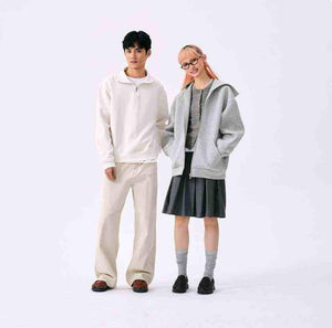 Contemporary look showcasing شوز نيو بالانس الأصلي matched with modern streetwear attire.