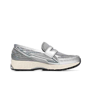 Detailed side angle highlighting حذاء نيو بالانس (New Balance shoe) featuring hybrid loafer and runner design elements.