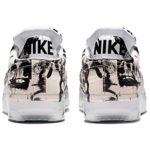 The rear view showcases Nike Shoes details, combining the حذاء نايك الأصلي مع ميزات حذاء نايكي جرافيتي أسود وأبيض | Nike Graffiti Black & White وجودة شوز نايك وتشكيلة nike schuhe.