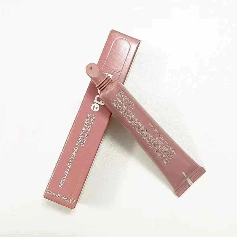 Rhode Skin مرطب شفاه ملون للترطيب والحماية البشرة.