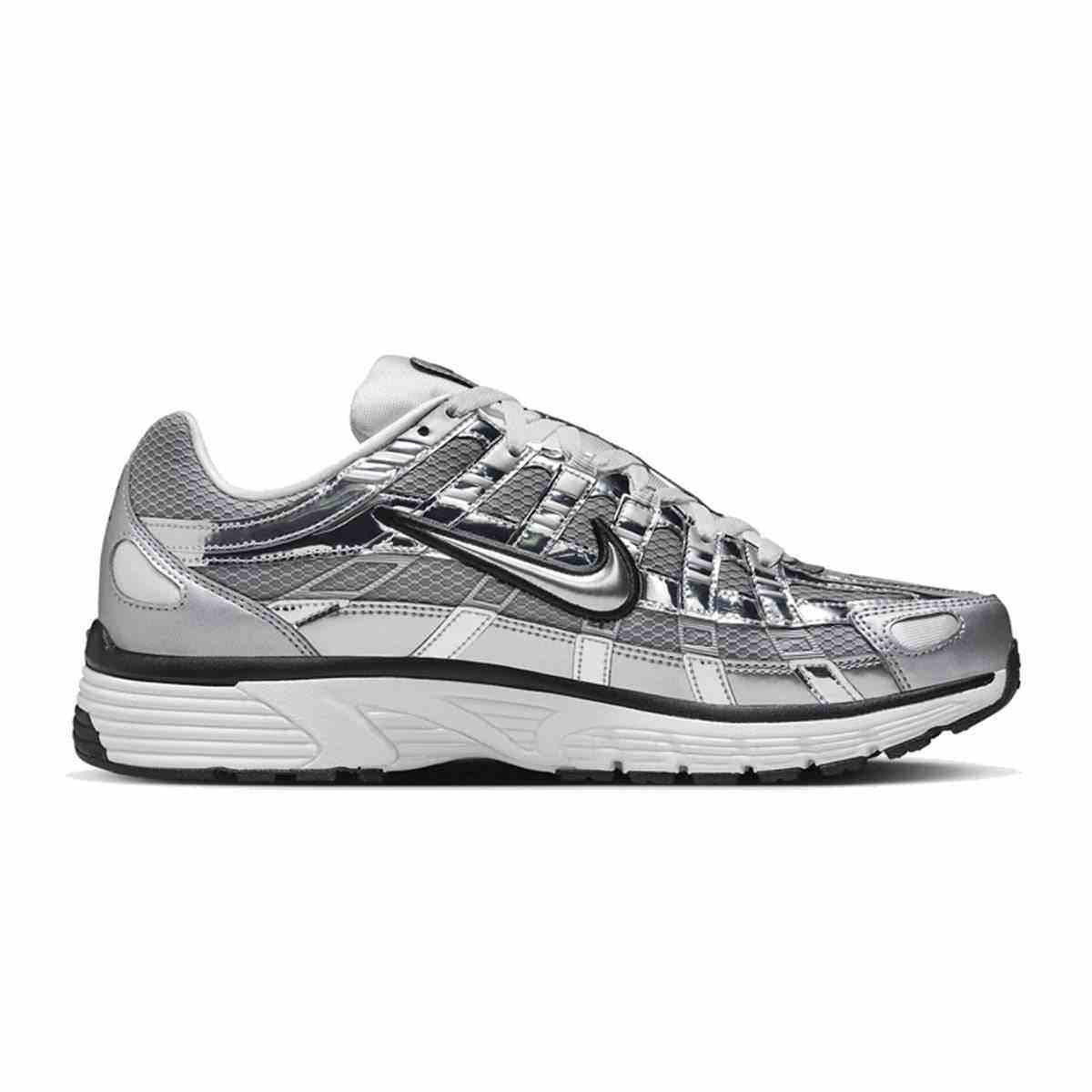 View the side profile of the حذاء نايك الأصلي featuring Nike Shoes design, representing the finest شوز نايك المميز مع حذاء P-6000 لون فضي ميتاليك بتصميم رياضي عصري وتصاميم nike schuhe.
