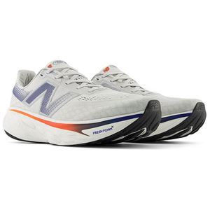 Pair of grey New Balance running shoes viewed from the front angle with thick Fresh Foam X cushioning