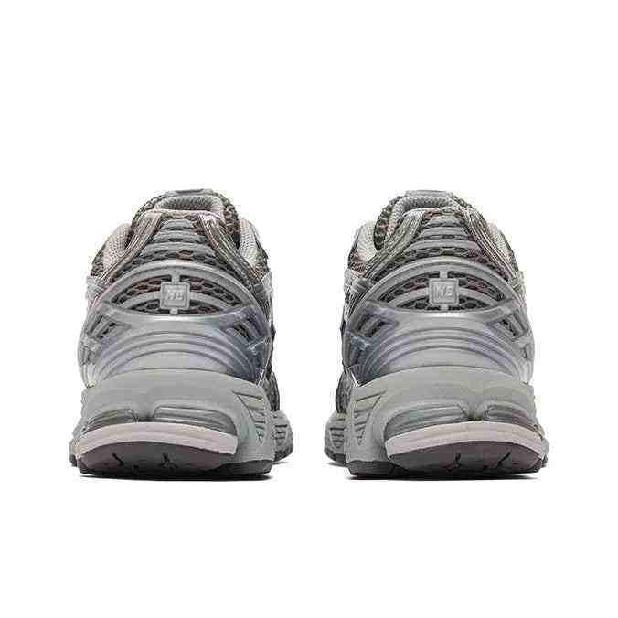 Rear view of dark grey and metallic silver New Balance running shoes