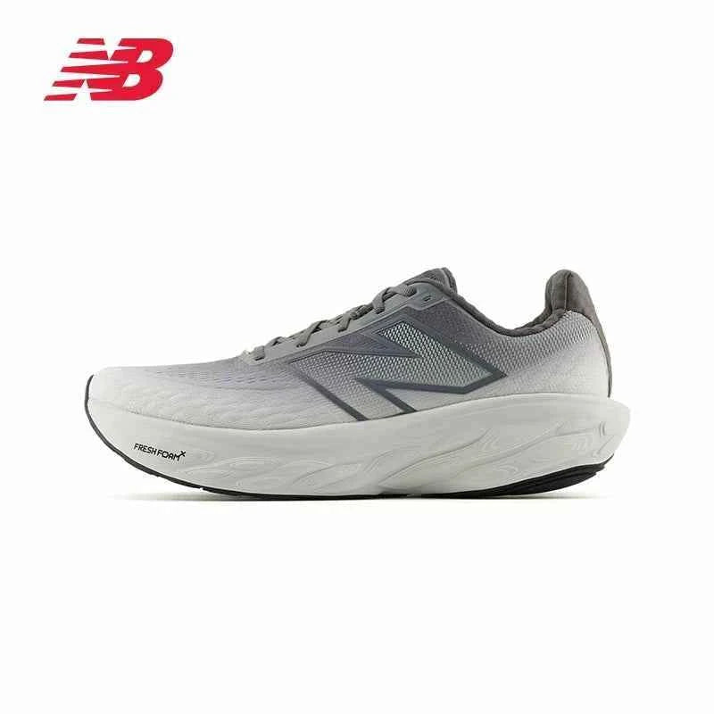 Side profile of a grey New Balance running shoe featuring a light-to-dark grey gradient mesh upper, dark charcoal "N" logo, thick light grey Fresh Foam X sole, and red logo branding in the top left corner