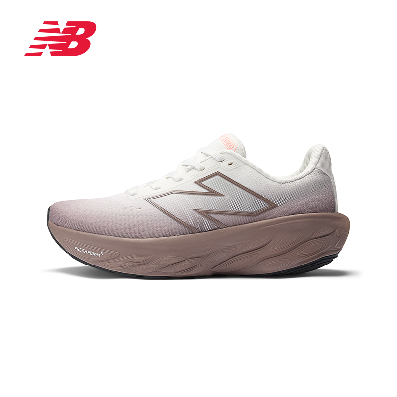 Side view profile of a grey and brown New Balance running sneaker with thick Fresh Foam X cushioning