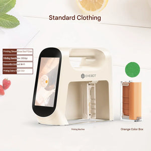 Complete retail package of طابعة الطعام المحمولة (Portable Food Printer) paired with an orange ink box.