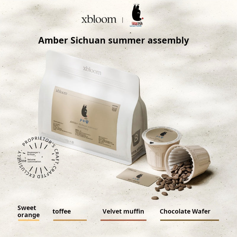 A promotional image for XBloom xpods coffee capsules, featuring the 'Amber Sichuan summer assembly'. It shows a bag of XBloom coffee, several individual XBloom xpods capsules, loose roasted coffee beans, and a card. Below these items, color-coded taste profiles are listed for 'Sweet orange', 'toffee', 'Velvet muffin', and 'Chocolate Wafer'. There's also a round 'PROPRIETOR'S CRAFT' stamp on the left. Next to it is an empty white media upload placeholder with a plus sign.