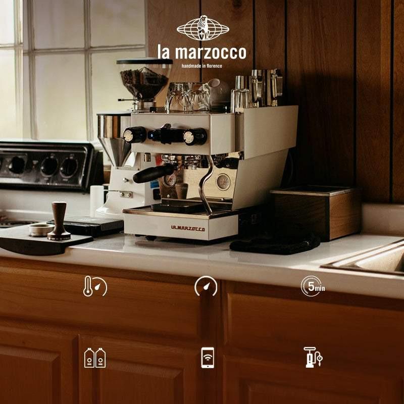 صانعة قهوة La Marzocco Linea Micra في ركن القهوة المنزلي home barista station setup.