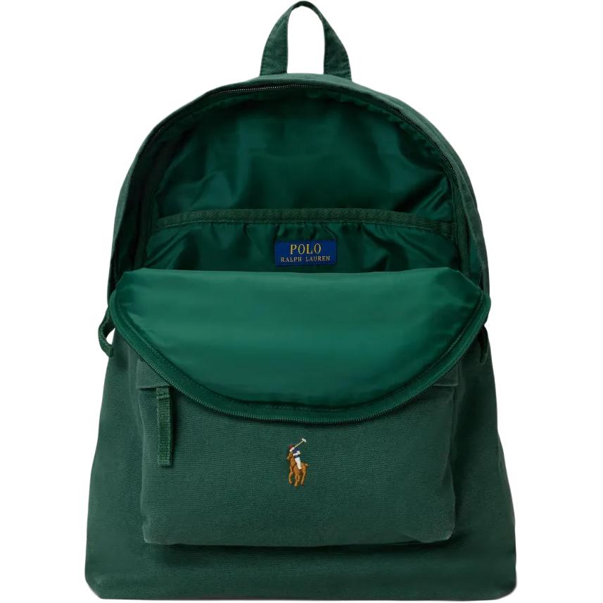 Open interior view of an original Ralph Lauren green school backpack showing main storage compartment and blue interior brand label.

عرض داخلي مفتوح لحقيبة ظهر مدرسة رالف لورين أصلية باللون الأخضر يوضح مساحة التخزين الرئيسية وعلامة الماركة الزرقاء الداخلية.