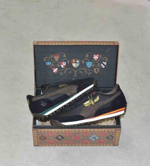 Puma Easy Rider Harry Potter shoes presented with custom Hogwarts chest collector packaging box.