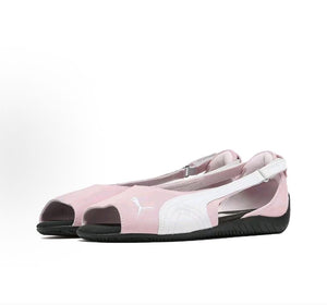 Pair of original Puma Speedcat Ballet open-toe pink white shoes front angle view on white background.