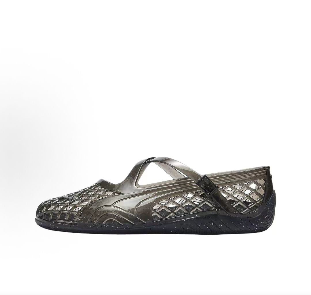 Puma Speedcat Ballet Strap black jelly shoes side view displaying translucent woven design.