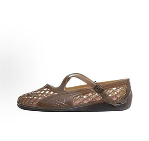 Puma Speedcat Ballet Strap brown jelly shoes side view displaying translucent woven design.