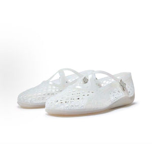 Pair of original Puma Speedcat Ballet Strap clear jelly shoes front angle view on white background.