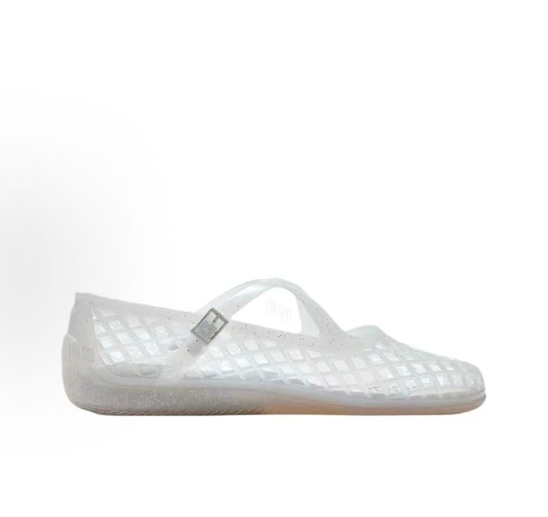 Puma Speedcat Ballet Strap clear jelly women shoes profile view showing buckle strap detail.