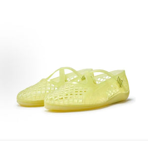 Pair of original Puma Speedcat Ballet Strap yellow jelly shoes front angle view on white background.