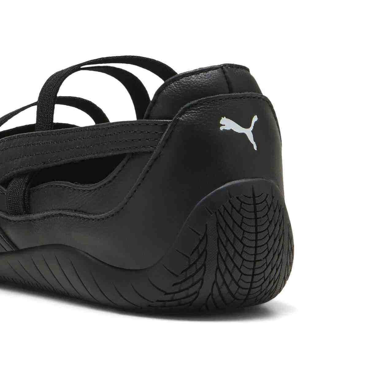 Puma Speedcat Ballet triple black shoe back close-up view showing white Puma cat heel logo.