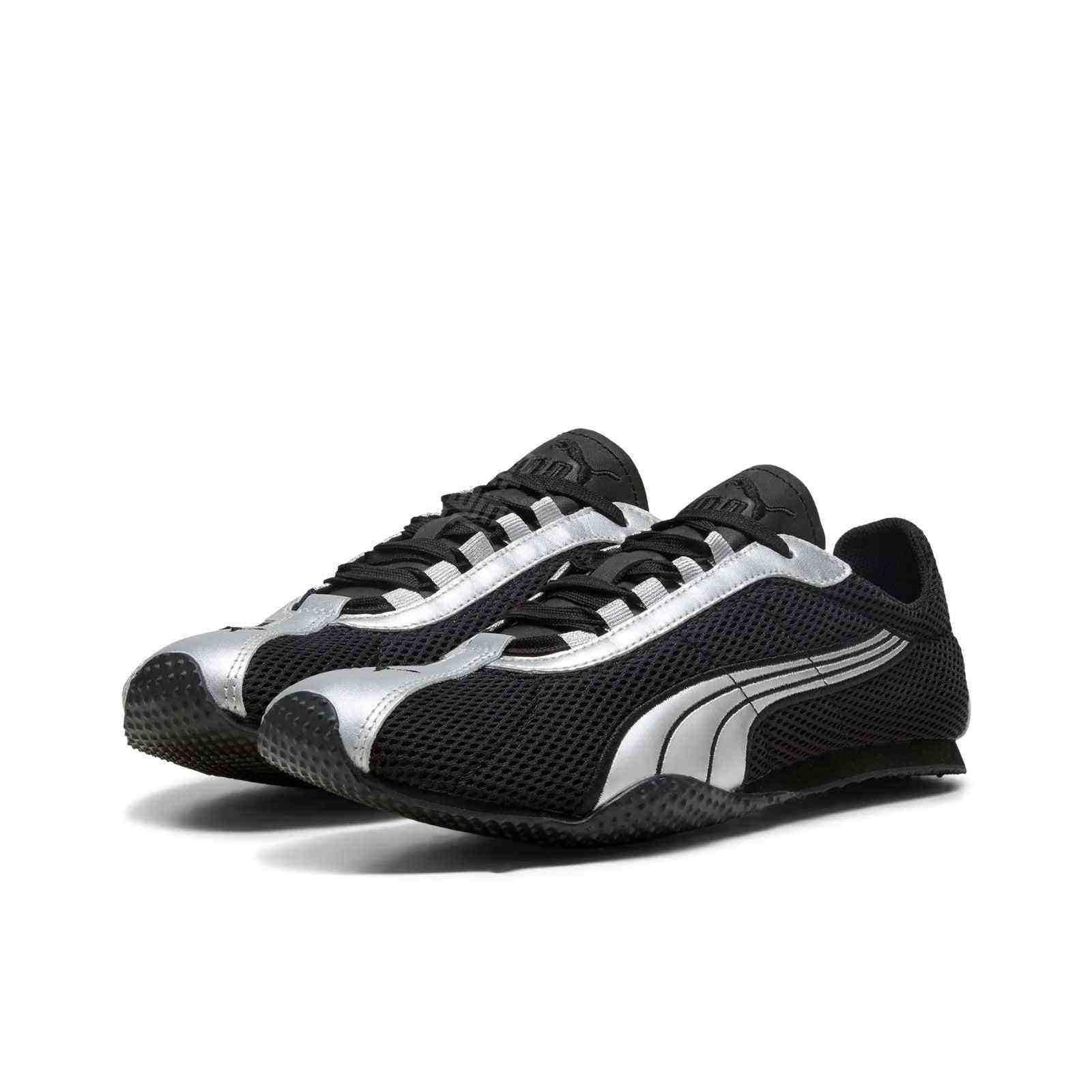 Pair of original Puma Speedcat black silver mesh shoes front angle view on white background.